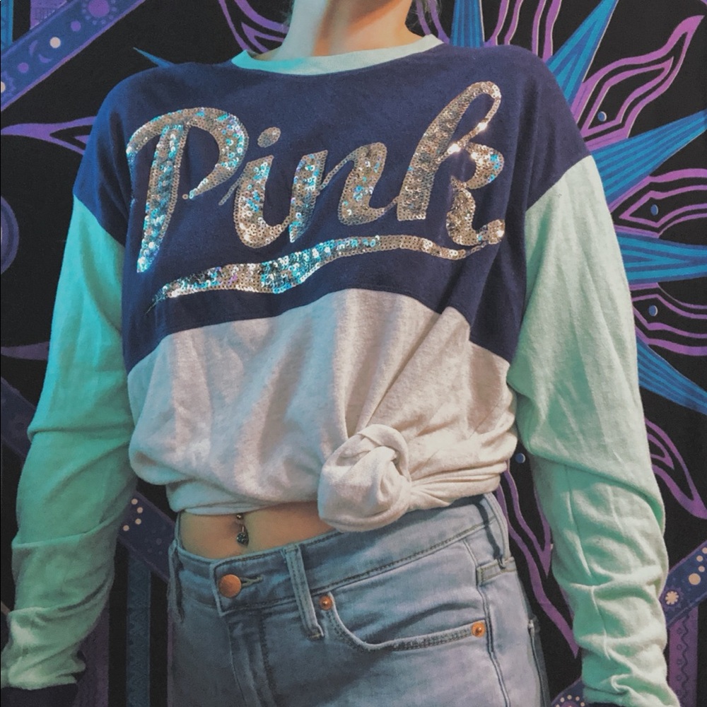 Pink long sleeve shirt.